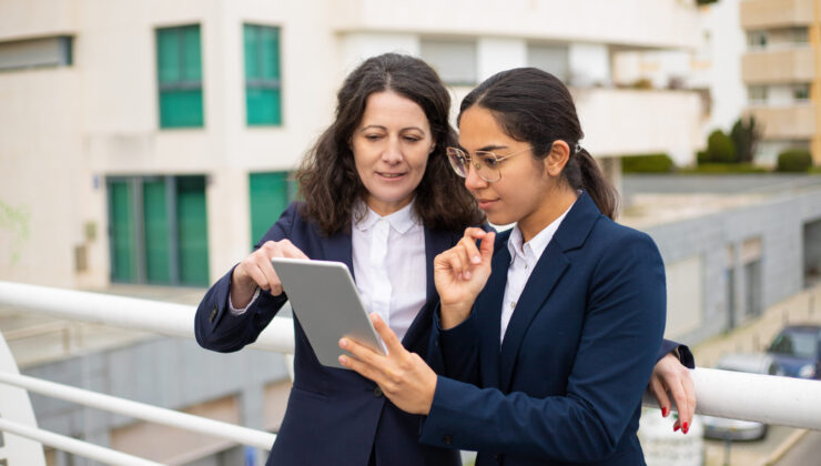 Content businesswomen using tablet pc Jobs in Greece For Indians